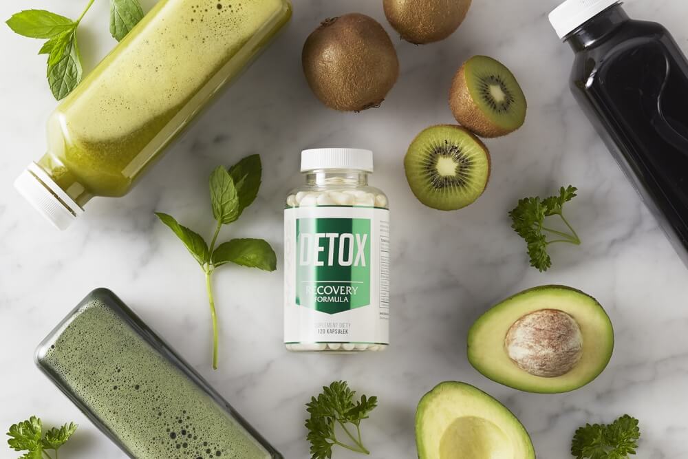 flat lay photo of Blex Detox food supplement in arrangement with green fruits on bright marble