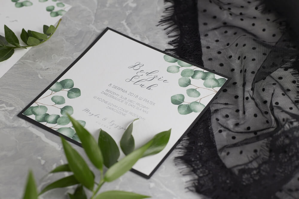 creative commercial photo of an wedding invitation from biały kot angle shot
