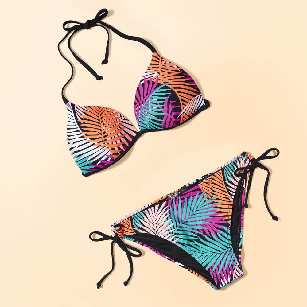 photo of a colorful House bikini set on a sandy background