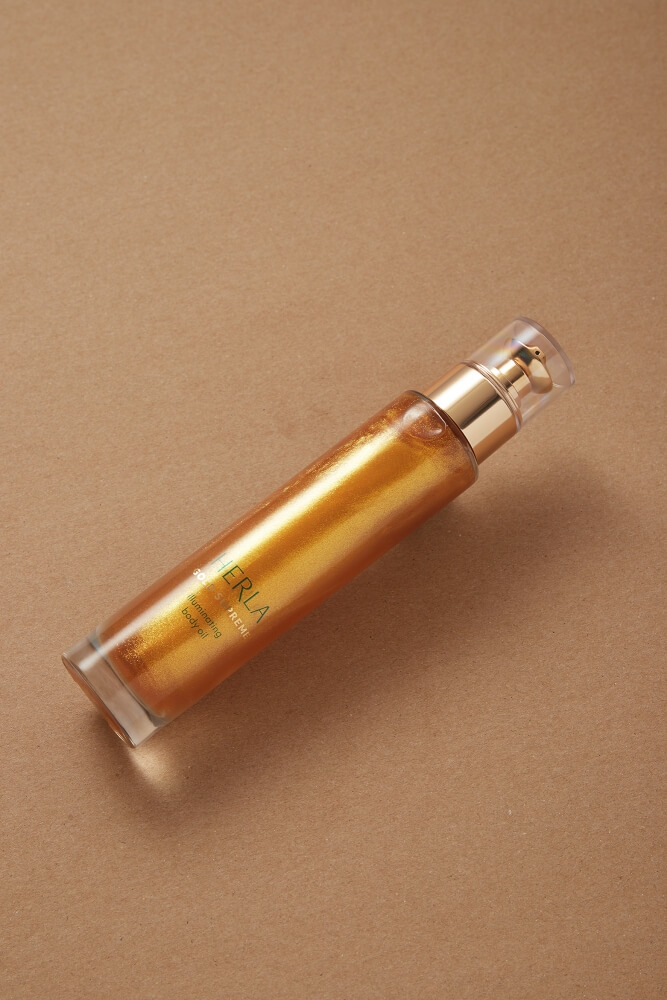 commercial photo of lying cosmetic on a golden background