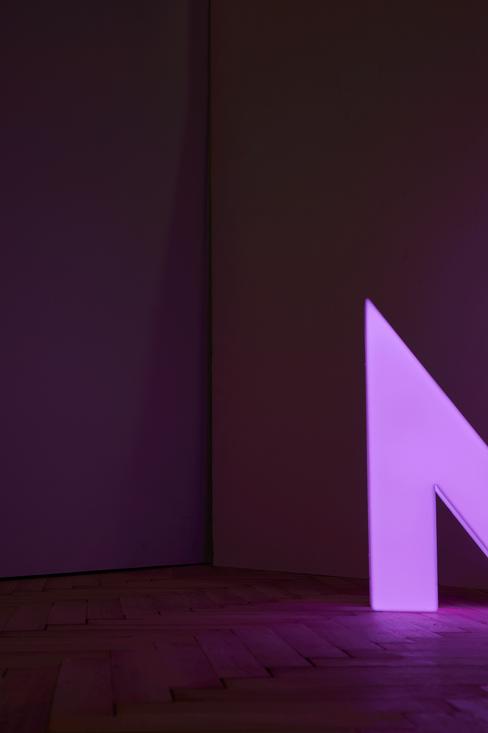 gif of a moving changing colors letter